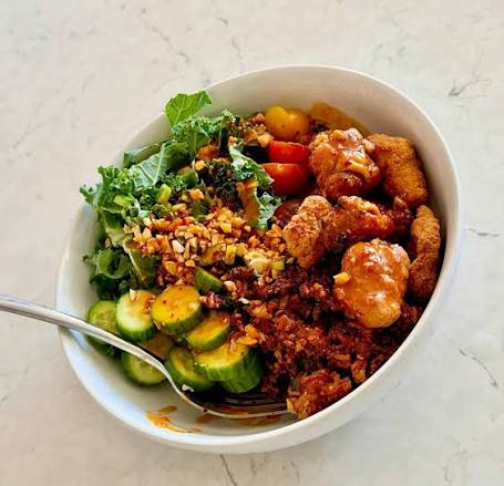 Popcorn Chicken Over Rice & Salad